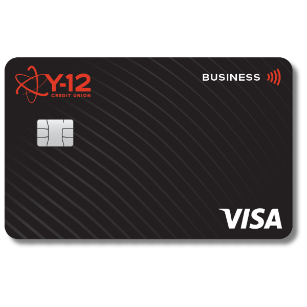 Photo of person holding the Visa Signature Rewards Credit Card.