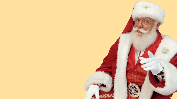 Santa pointing at camera.