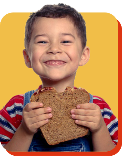 Child with peanut butter and jelly sandwich.