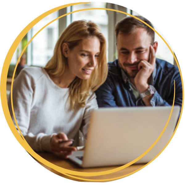 Couple looking at laptop together.