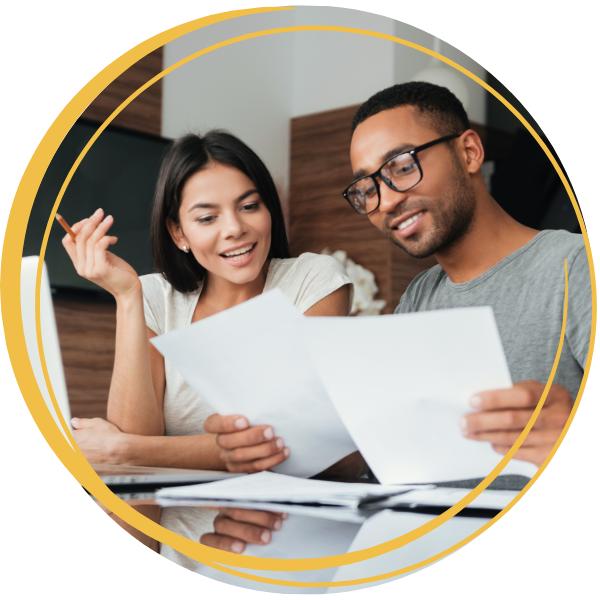 Couple looking at documents together.