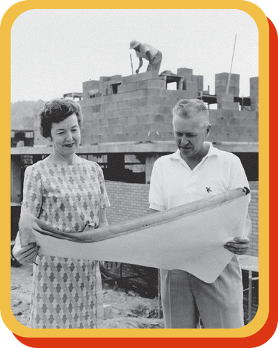 Woman and man looking at plans.